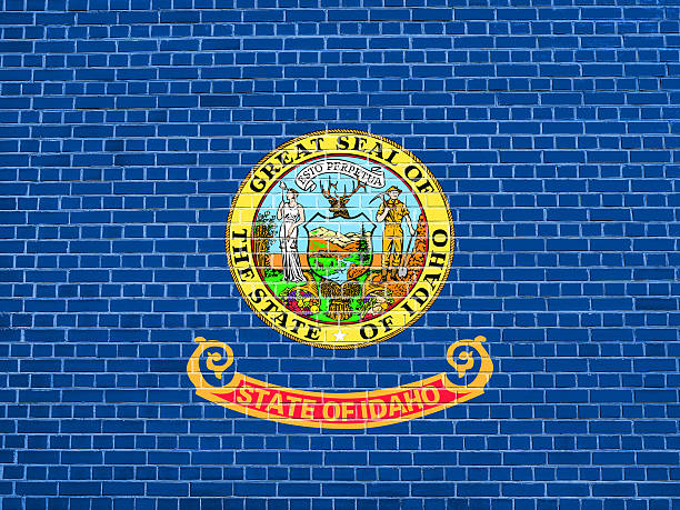 istock Flag of Idaho on brick wall texture background 612725862