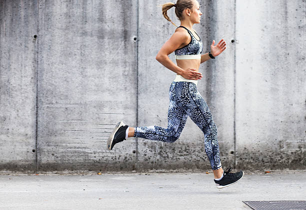 istock Female Athlete Running Outdoors 612726350