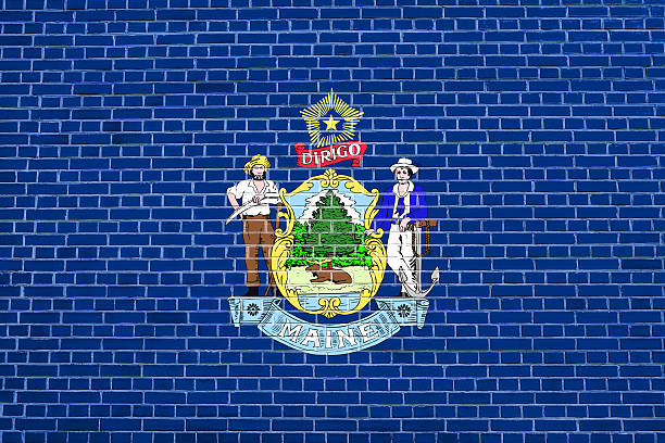 istock Flag of Maine on brick wall texture background 612726628