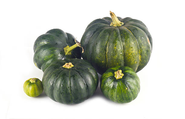istock Green pumpkin on white background 612726798
