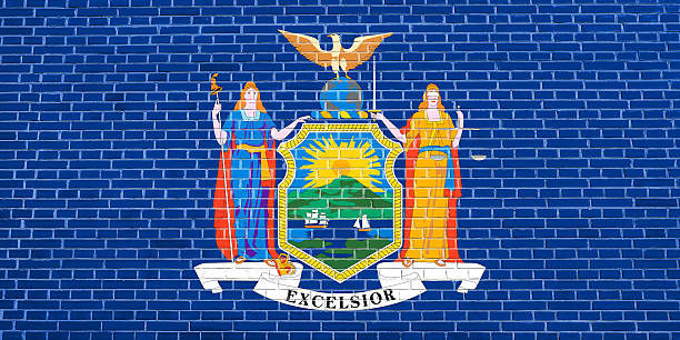 Flag of New York on brick wall texture background