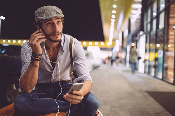 istock Handsome man listening music 612728540