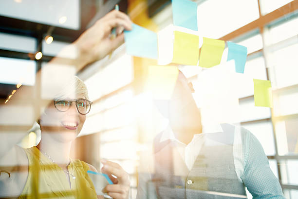 istock Two creative millenial small business owners working on social media 612728954
