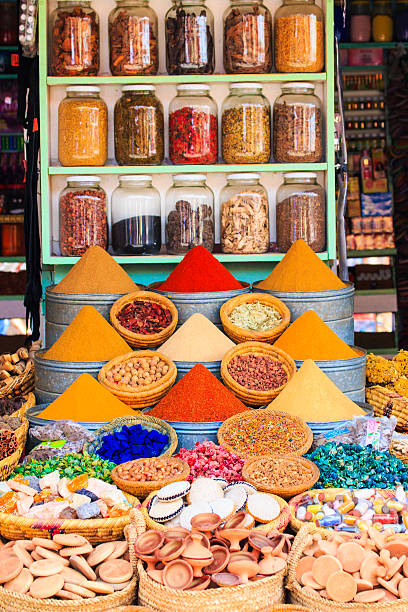 Marrakech, Morocco - February 11, 2016: Selection of herbs and dry flowers on a traditional Moroccan market (souk) in Marrakech, Morocco