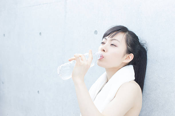 istock Japanese woman exercising 612730136