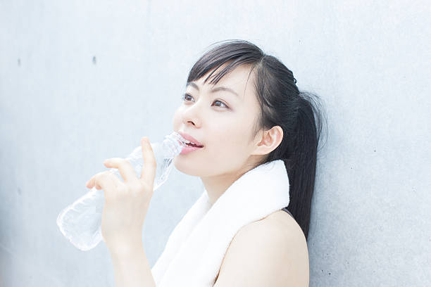 istock Japanese woman exercising 612730174