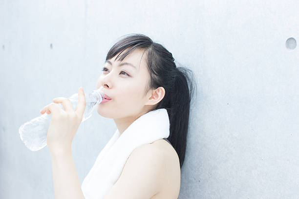 istock Japanese woman exercising 612730204