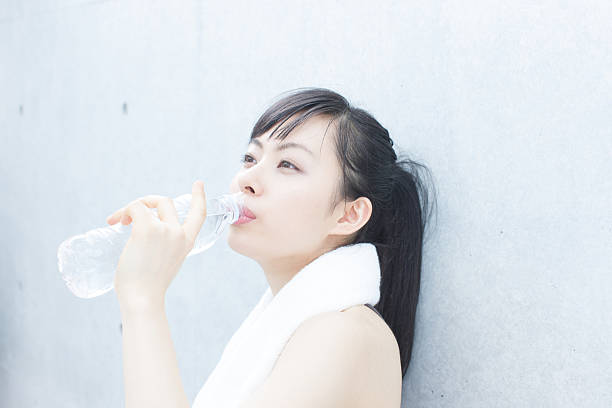 istock Japanese woman exercising 612730236