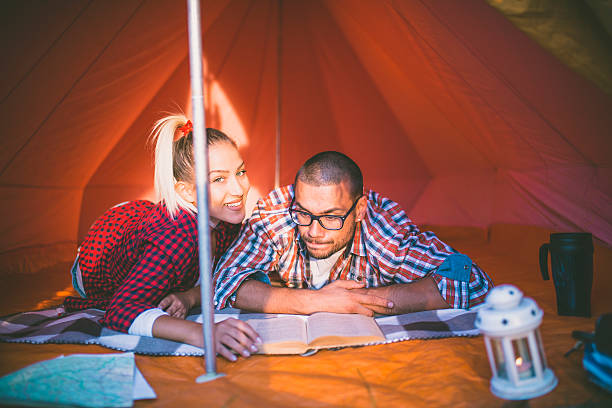 istock couple camping together 612731622