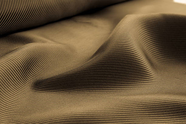 istock Carbon fiber composite raw material background 612732890