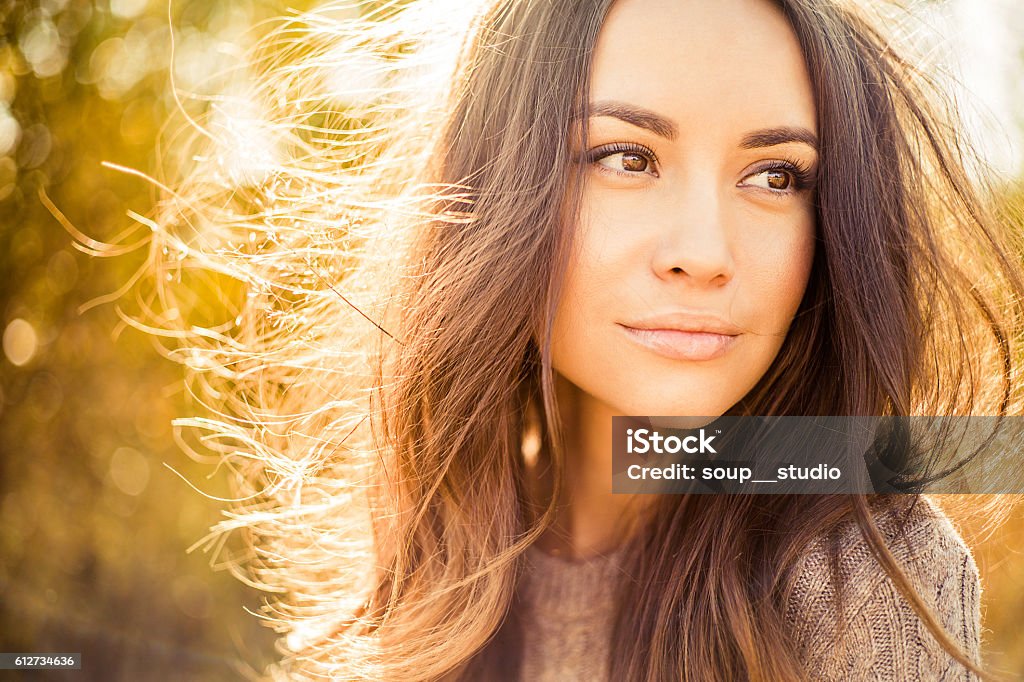 Beautiful lady in autumn landscape Outdoor atmospheric fashion photo of young beautiful lady in autumn landscape Women Stock Photo