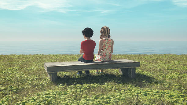 istock Young couple sitting on the bench 612734750