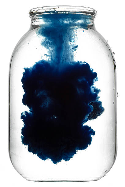 istock Paint swirling in water. 612736158