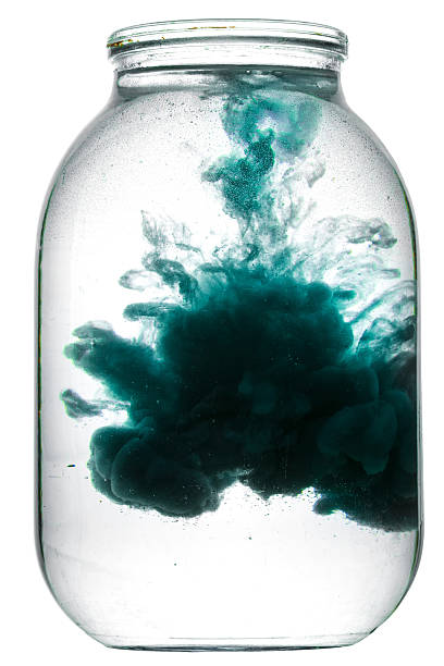 istock Paint swirling in water. 612736256
