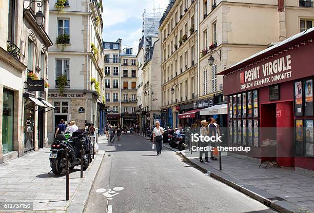 People Walk On One Of Streets Of Le Marais Stock Photo - Download Image Now - Adulation, Motorcycle, Architecture