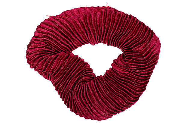 istock Red hair scrunchy isolated on white background 612738160