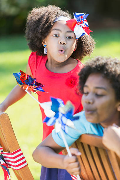 istock Mixed race children celebrating American holiday 612738854
