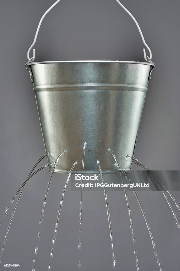 Leaky Bucket Bucket Stock Photo
