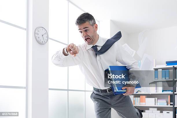 Businessman In A Hurry Checking Time Stock Photo - Download Image Now - Businessman, Deadline, Human Mouth