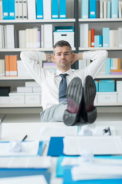 istock Lazy businessman in his office 612741954