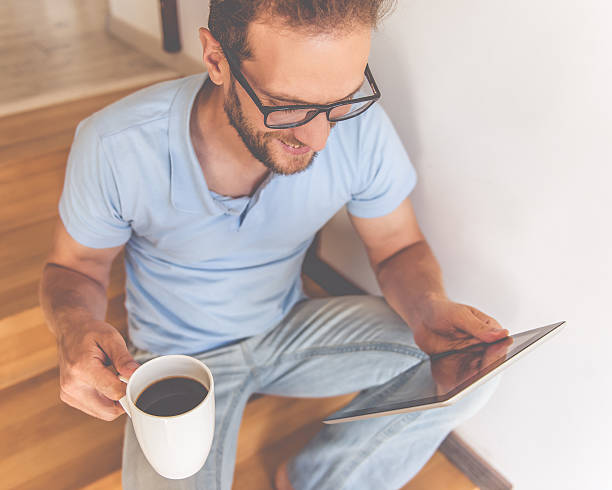 istock Handsome businessman at home 612742066