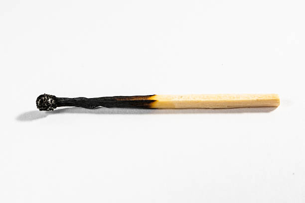 istock Match Stick Macro Detail Fire Symbol Safety White Isolated Backg 612744404