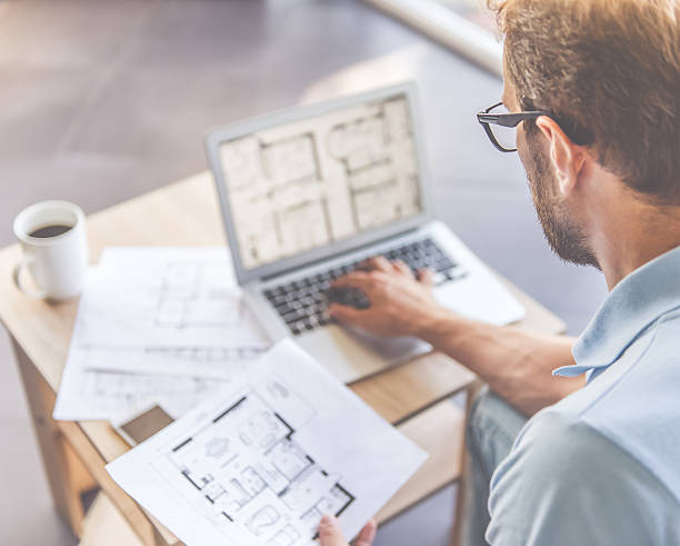 istock Handsome businessman at home 612744888