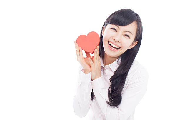 istock Japanese woman holding a heart shape box 612745472