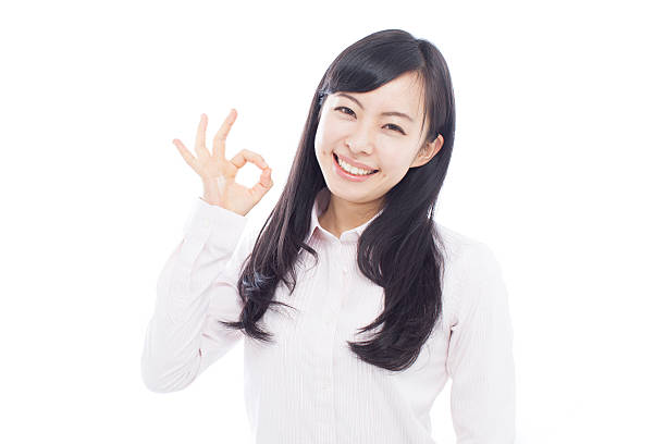 istock Japanese woman making gestures 612746090