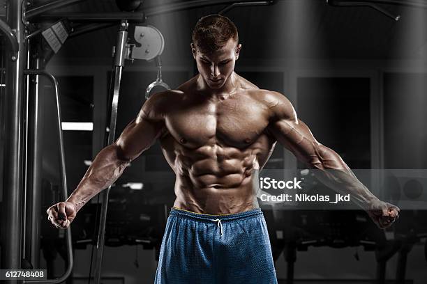 Sexy Muscular Man In Gym Shaped Abdominal Working Out Abs Stock Photo - Download Image Now