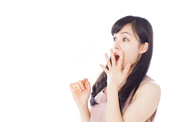 Japanese woman expresses emotions stock photo