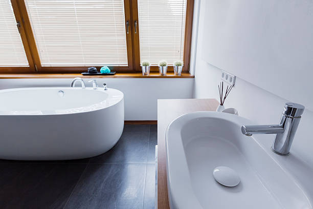 istock Snowy-white amenities in bathroom 612751422