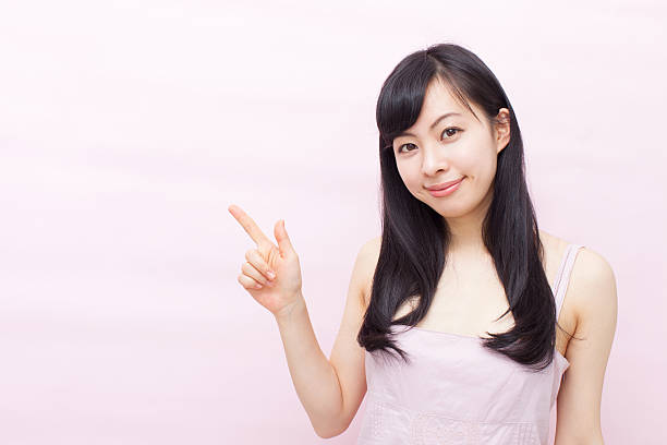 istock Japanese woman making gestures 612751606