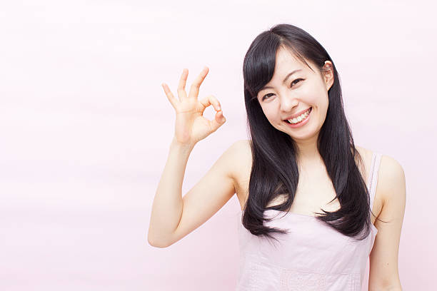 istock Japanese woman making gestures 612751912