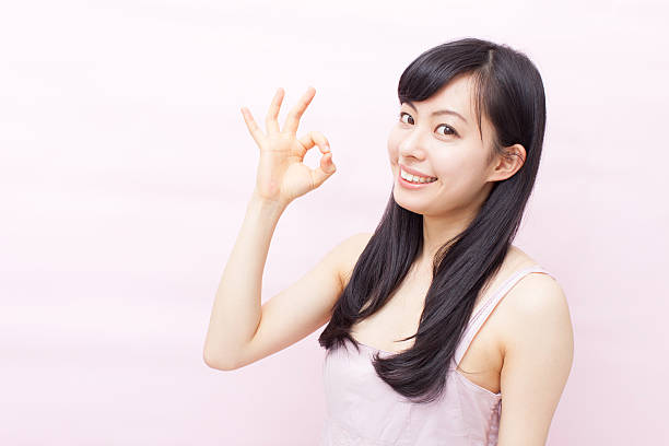 istock Japanese woman making gestures 612751940