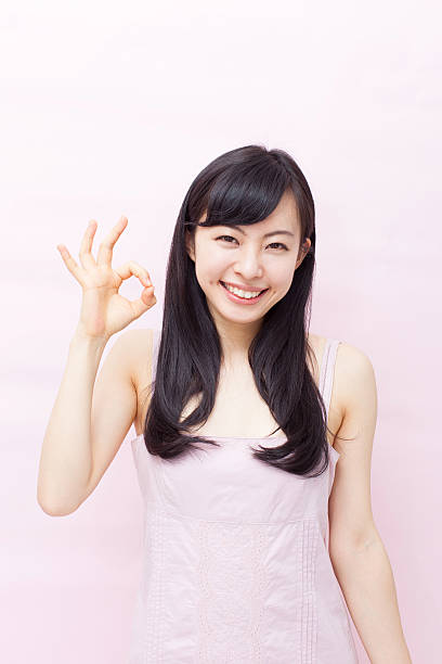 istock Japanese woman making gestures 612751974
