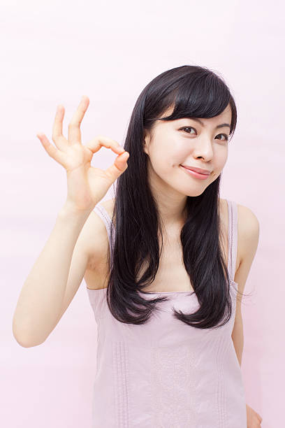 istock Japanese woman making gestures 612752132