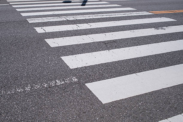 istock Pedestrian crossing with road marking. 612754528