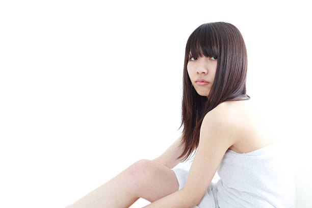 istock Japanese woman wrapped in towel 612756320