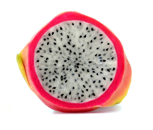 istock closeup of dragon fruit slice isolated 612758468