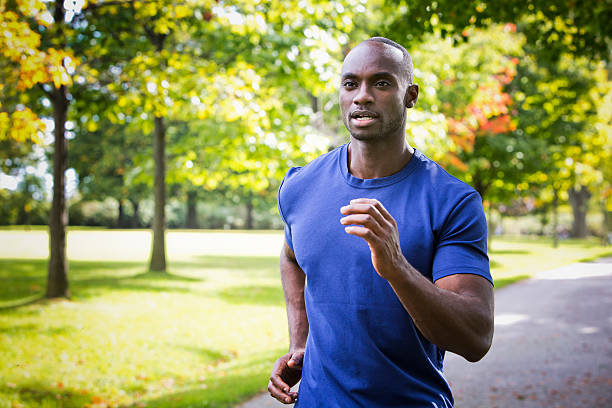 istock young man running outdoors 612758546