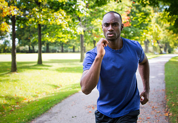 istock young man running outdoors 612758588