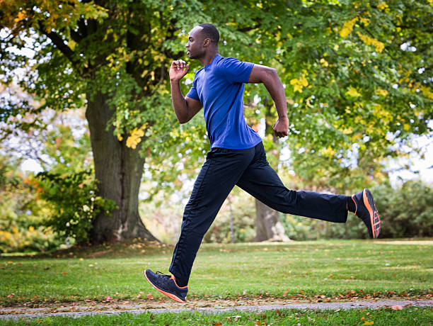 istock young man running outdoors 612758634