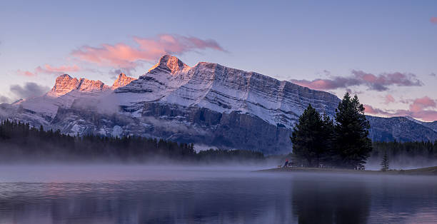 istock Rundle Mountain reflecting in Two Jack Lake 612758846
