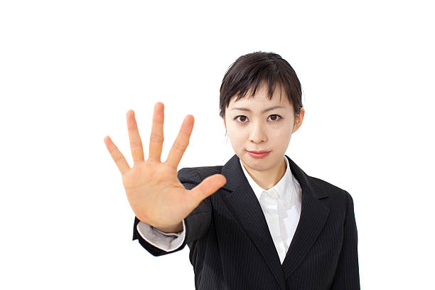 istock Japanese businesswoman making gestures 612759480
