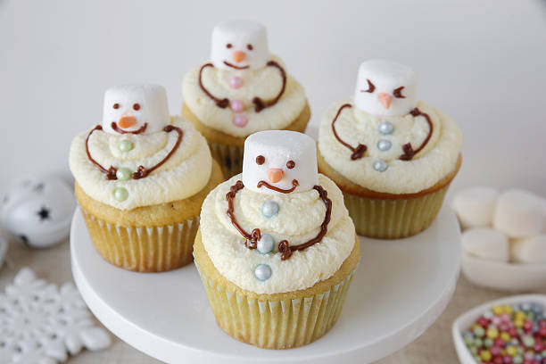istock Fun homemade melting snowman cupcakes for kids 612761480