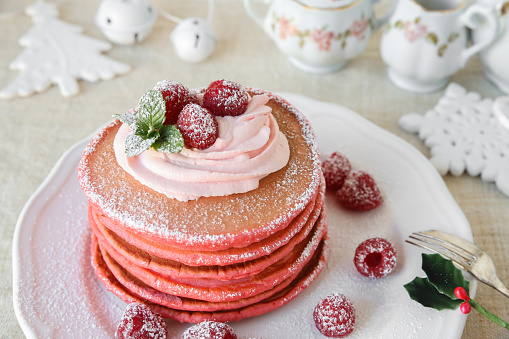 Red velvet pancakes breakfast with Christmas decoration