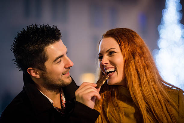istock Sweet love - couple eating chocolate 612816488