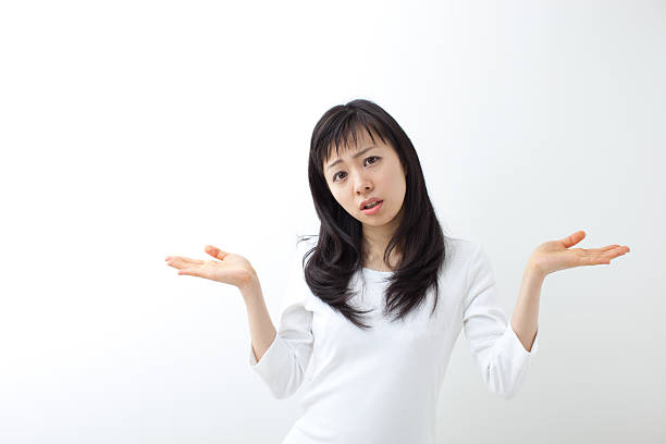 istock Japanese woman making gestures 612817232