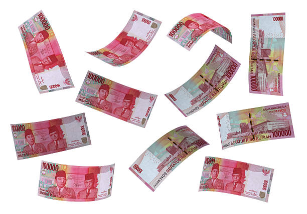 rupia indonesiana soldi 3d sfondo bianco - indonesian currency foto e immagini stock